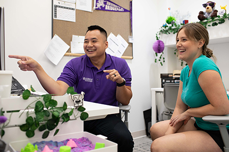 UB Student working with admissions officer