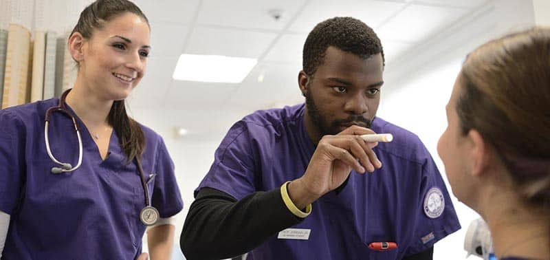 nurse examining a patient